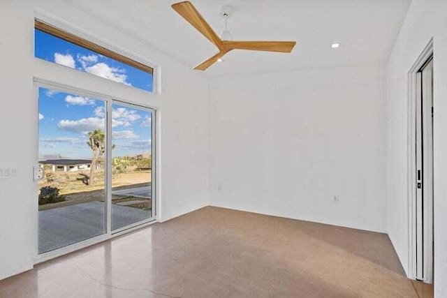 unfurnished room featuring ceiling fan