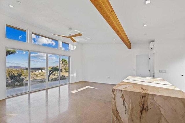 unfurnished living room with ceiling fan, a towering ceiling, and beamed ceiling