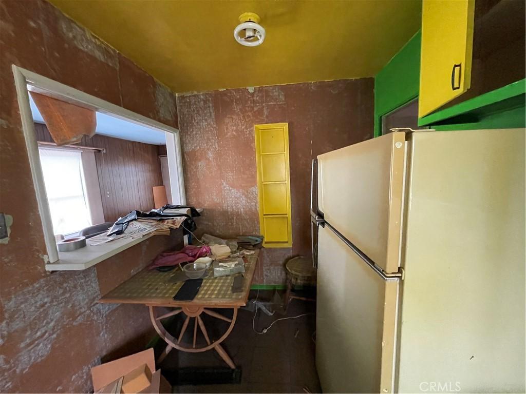 kitchen featuring fridge