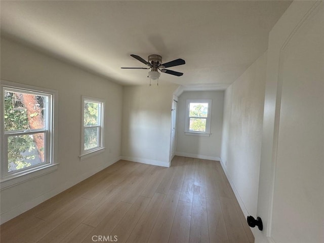 unfurnished room featuring ceiling fan and light hardwood / wood-style flooring