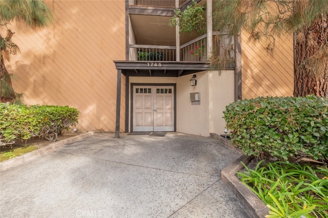 doorway to property with a balcony