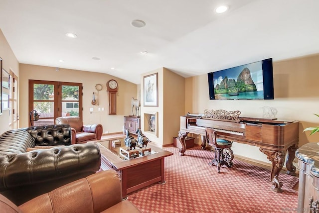 carpeted living room with french doors and vaulted ceiling