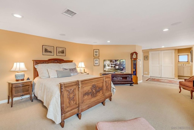 bedroom with light carpet