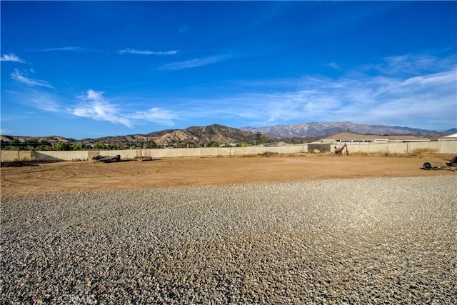 mountain view featuring a rural view