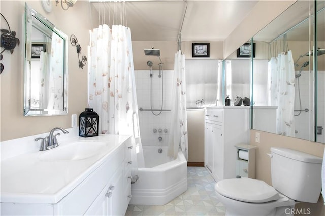 full bathroom featuring vanity, toilet, and shower / tub combo with curtain