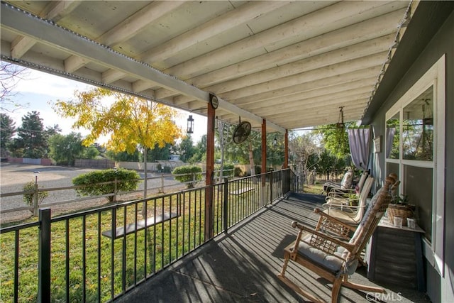 wooden terrace with covered porch