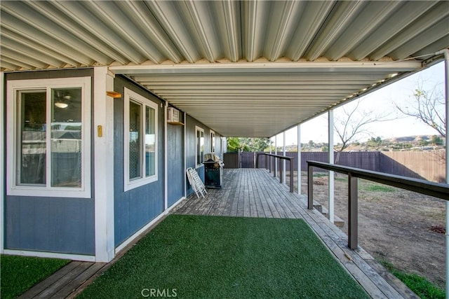 deck featuring a grill