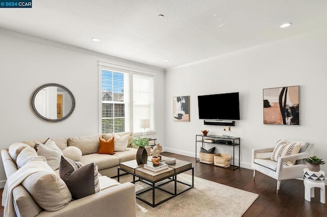 living room featuring dark wood-type flooring and ornamental molding