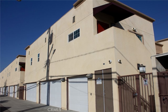 view of building exterior with a garage