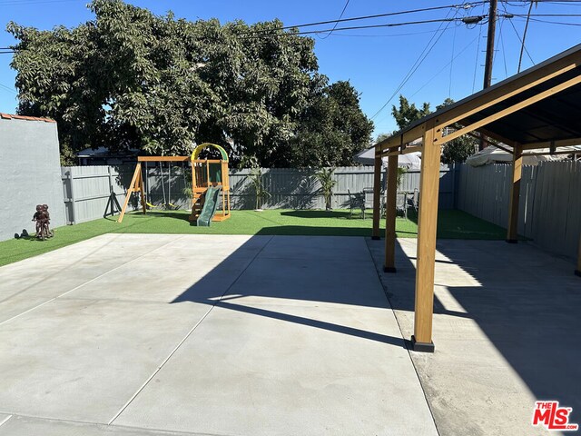 view of patio / terrace featuring a playground