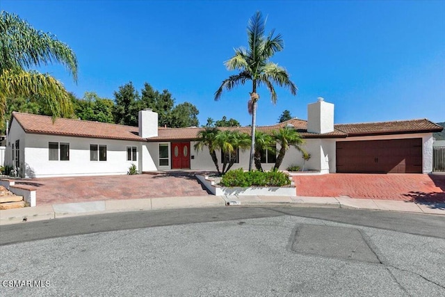 view of front of home with a garage