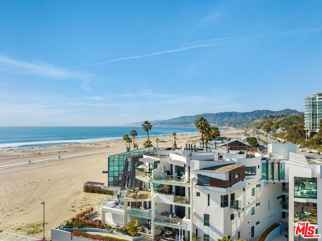 view of water feature with a beach view