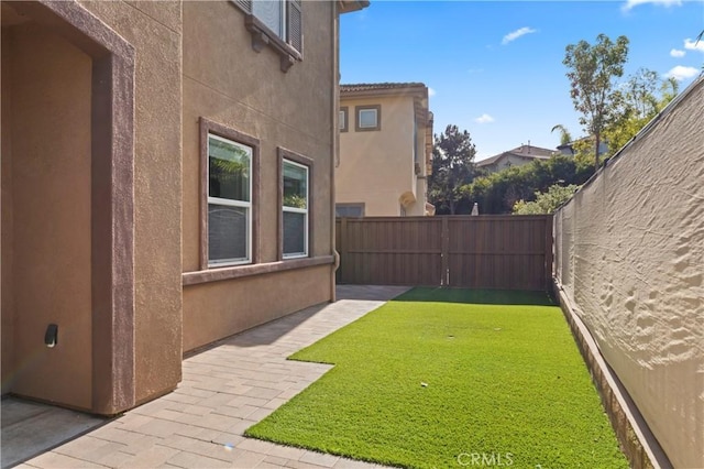 view of yard with a patio