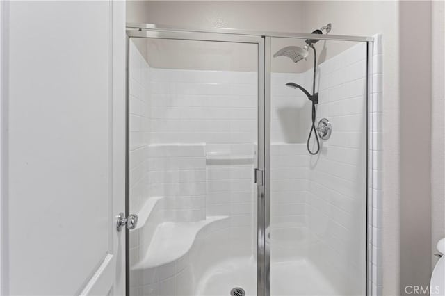 bathroom with an enclosed shower