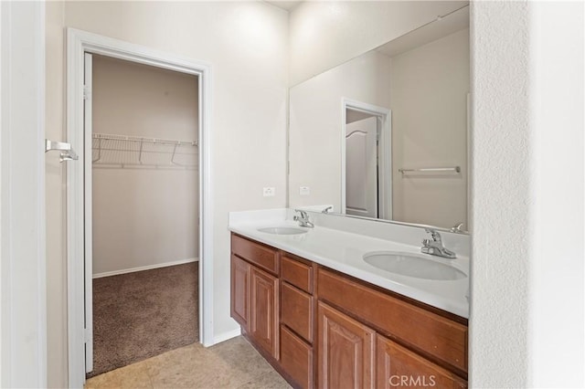 bathroom featuring tile patterned floors and vanity