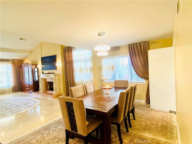 dining space with light tile patterned flooring