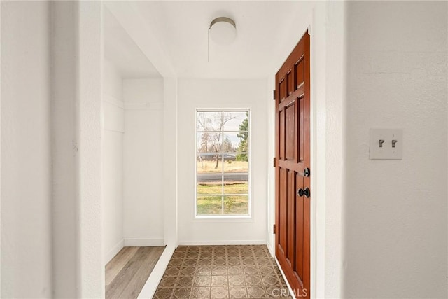 5690 Paradise Ave, Paradise, CA 95969 - doorway to outside featuring healthy amount of natural light and baseboards