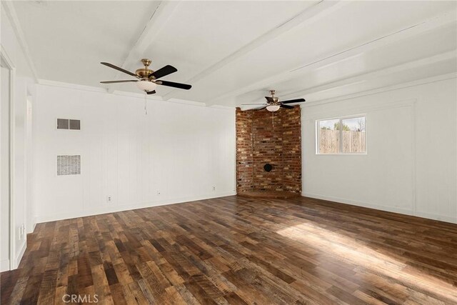 5690 Paradise Ave, Paradise, CA 95969 - unfurnished living room with beamed ceiling, a ceiling fan, and wood finished floors