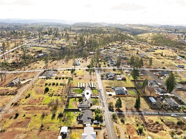 5690 Paradise Ave, Paradise, CA 95969 - aerial overview of property's location with mountains and nearby suburban area
