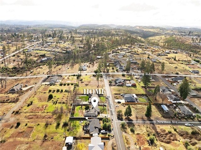 5690 Paradise Ave, Paradise, CA 95969 - aerial overview of property's location with mountains and nearby suburban area
