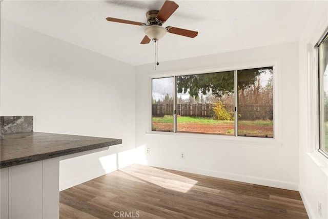 5690 Paradise Ave, Paradise, CA 95969 - unfurnished dining area featuring wood finished floors and ceiling fan
