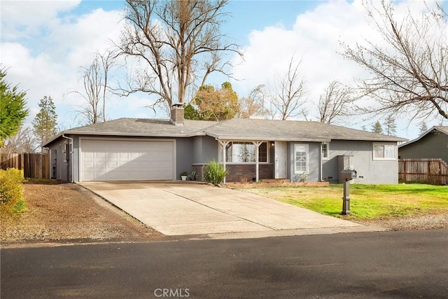 single story home with a garage and a front yard