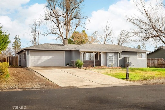 5690 Paradise Ave, Paradise, CA 95969 - ranch-style home with an attached garage, stucco siding, driveway, and a chimney