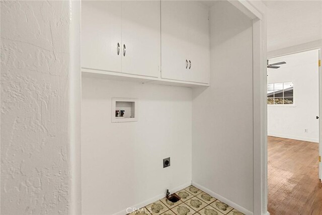 5690 Paradise Ave, Paradise, CA 95969 - washroom with hookup for an electric dryer, cabinet space, baseboards, and hookup for a washing machine