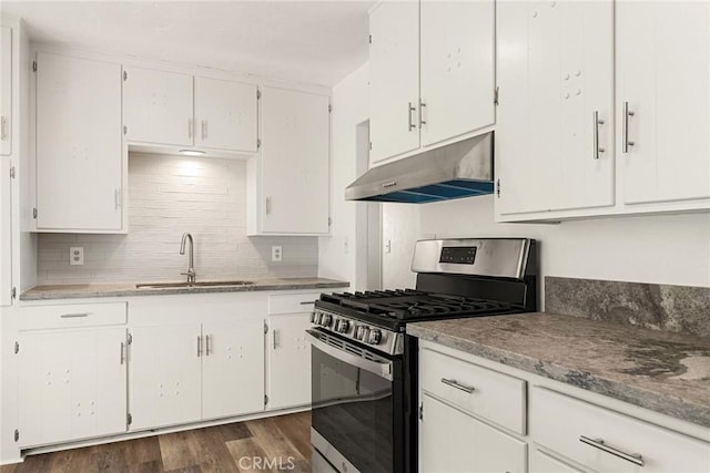 kitchen featuring dark hardwood / wood-style flooring, white cabinetry, stainless steel gas stove, and sink