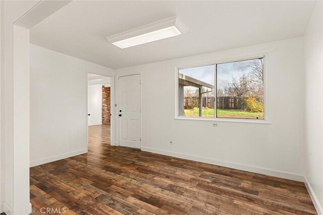 5690 Paradise Ave, Paradise, CA 95969 - spare room with dark wood-style flooring and baseboards