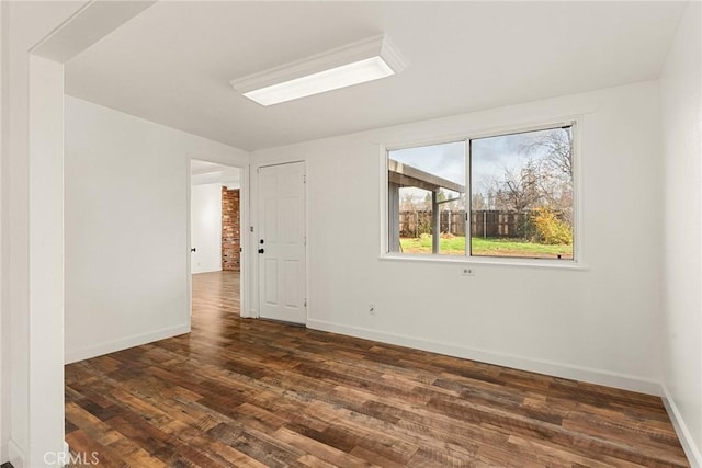 5690 Paradise Ave, Paradise, CA 95969 - empty room with dark wood-type flooring and baseboards