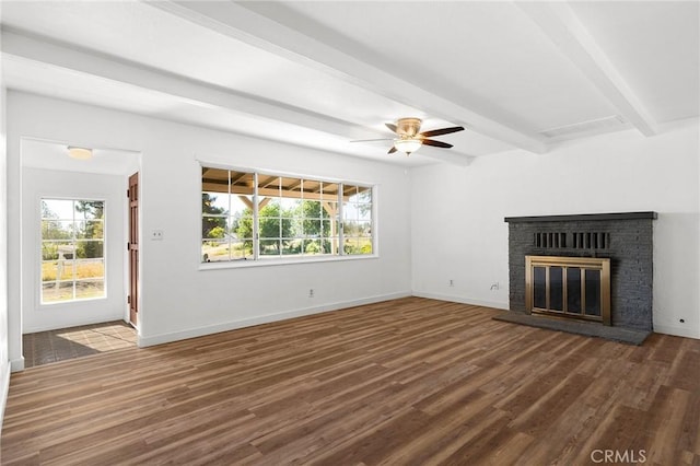 5690 Paradise Ave, Paradise, CA 95969 - unfurnished living room featuring beam ceiling, wood finished floors, ceiling fan, a brick fireplace, and baseboards