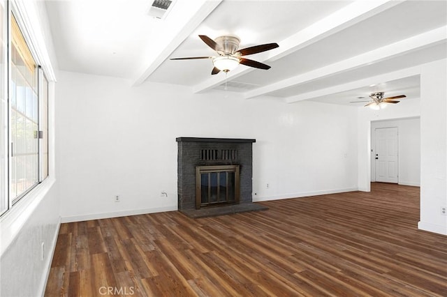 5690 Paradise Ave, Paradise, CA 95969 - unfurnished living room with ceiling fan, beamed ceiling, wood finished floors, and a fireplace