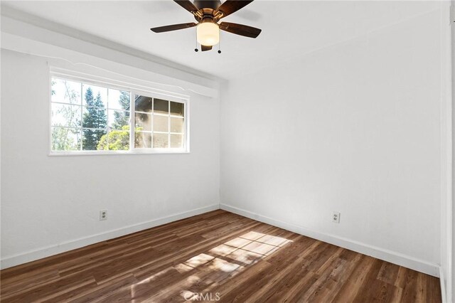 5690 Paradise Ave, Paradise, CA 95969 - empty room with baseboards, wood finished floors, and a ceiling fan