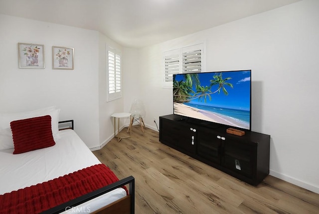 bedroom featuring light wood-type flooring