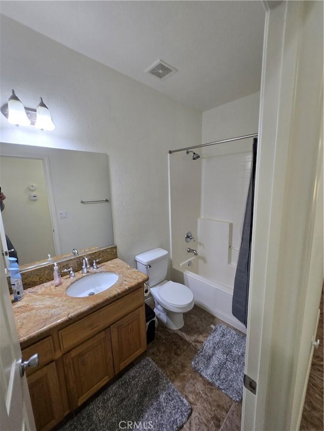 full bathroom featuring vanity, toilet, and shower / bath combo with shower curtain