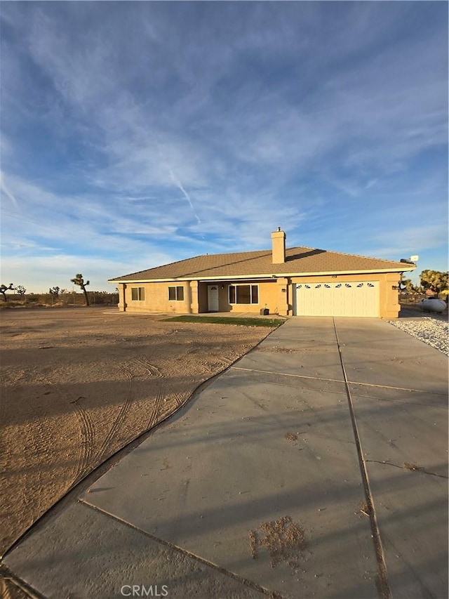 view of front of home with a garage