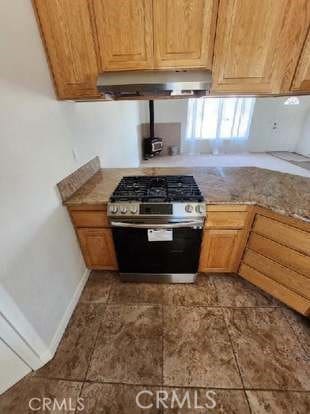 kitchen with stainless steel range with gas stovetop