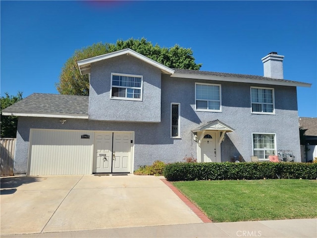 view of front of home with a front lawn