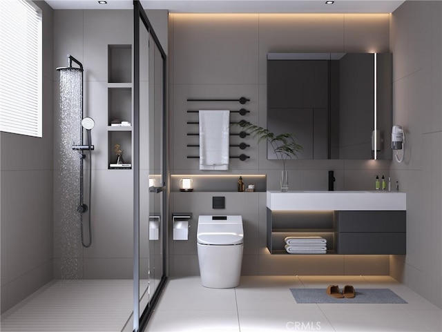 bathroom with a shower, vanity, toilet, and tile walls