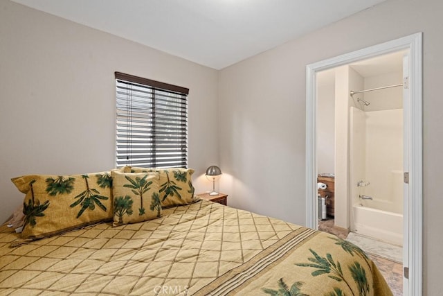 bedroom featuring ensuite bathroom