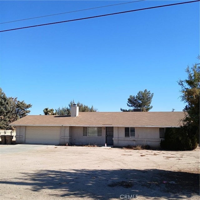 ranch-style house with a garage