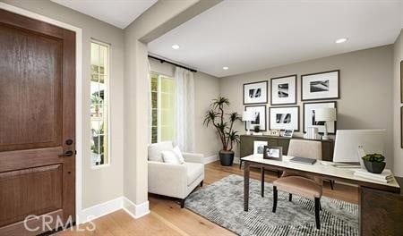 office area with light wood-type flooring