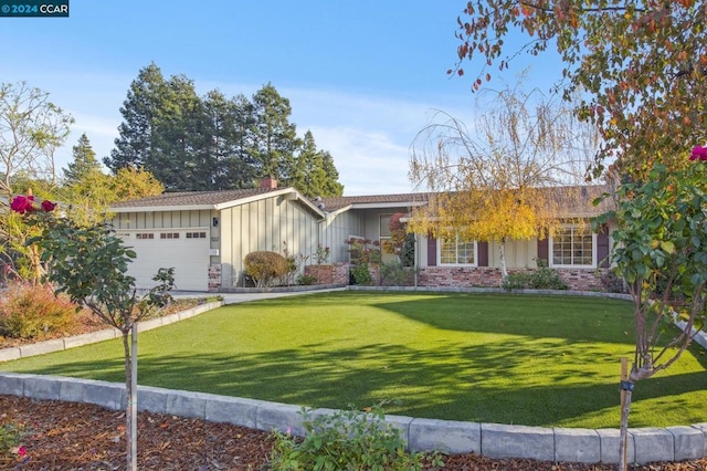 single story home featuring a front yard and a garage