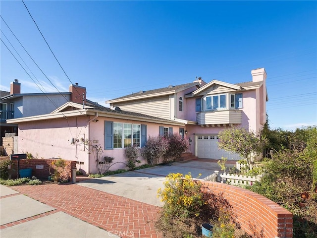 view of front of house with a garage