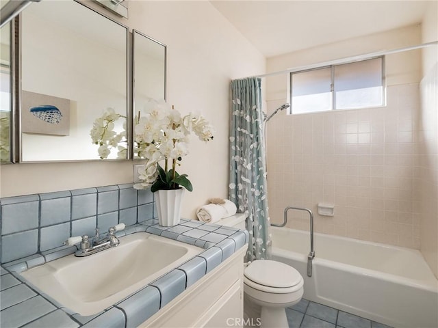 full bathroom with vanity, backsplash, shower / bath combination with curtain, tile patterned flooring, and toilet