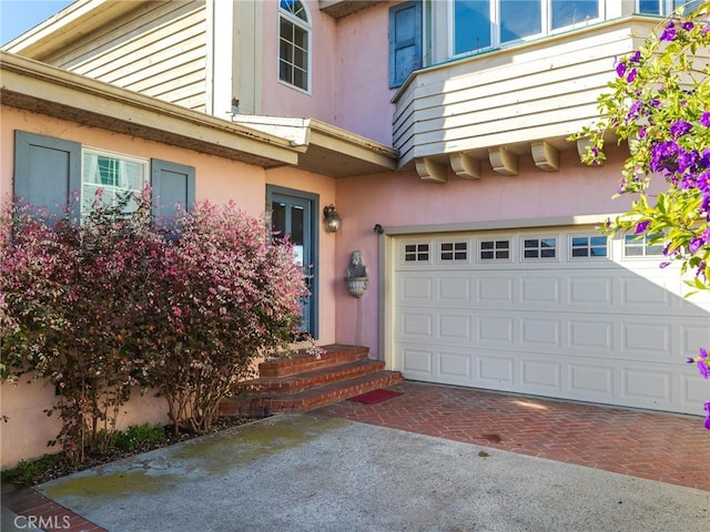 property entrance featuring a garage