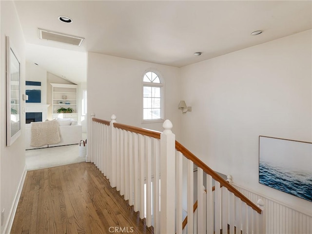 hallway featuring hardwood / wood-style floors