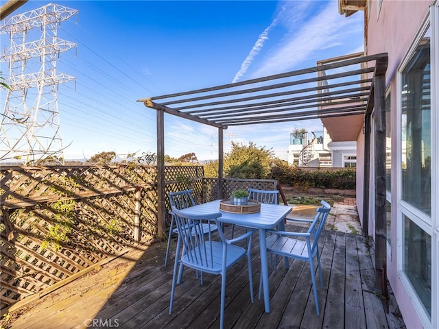 wooden deck with a pergola