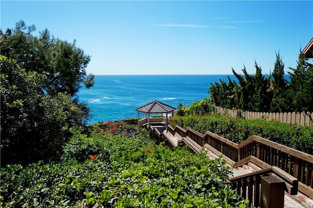 view of water feature featuring fence